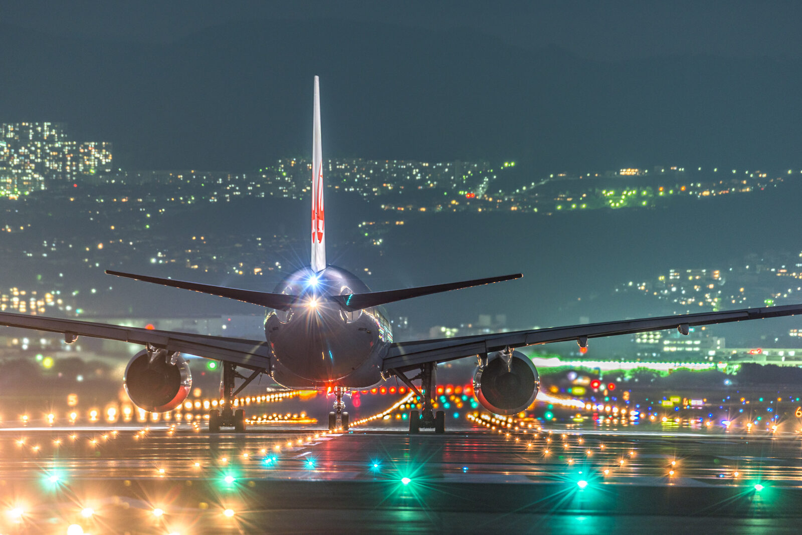 Airplane on the runway at night