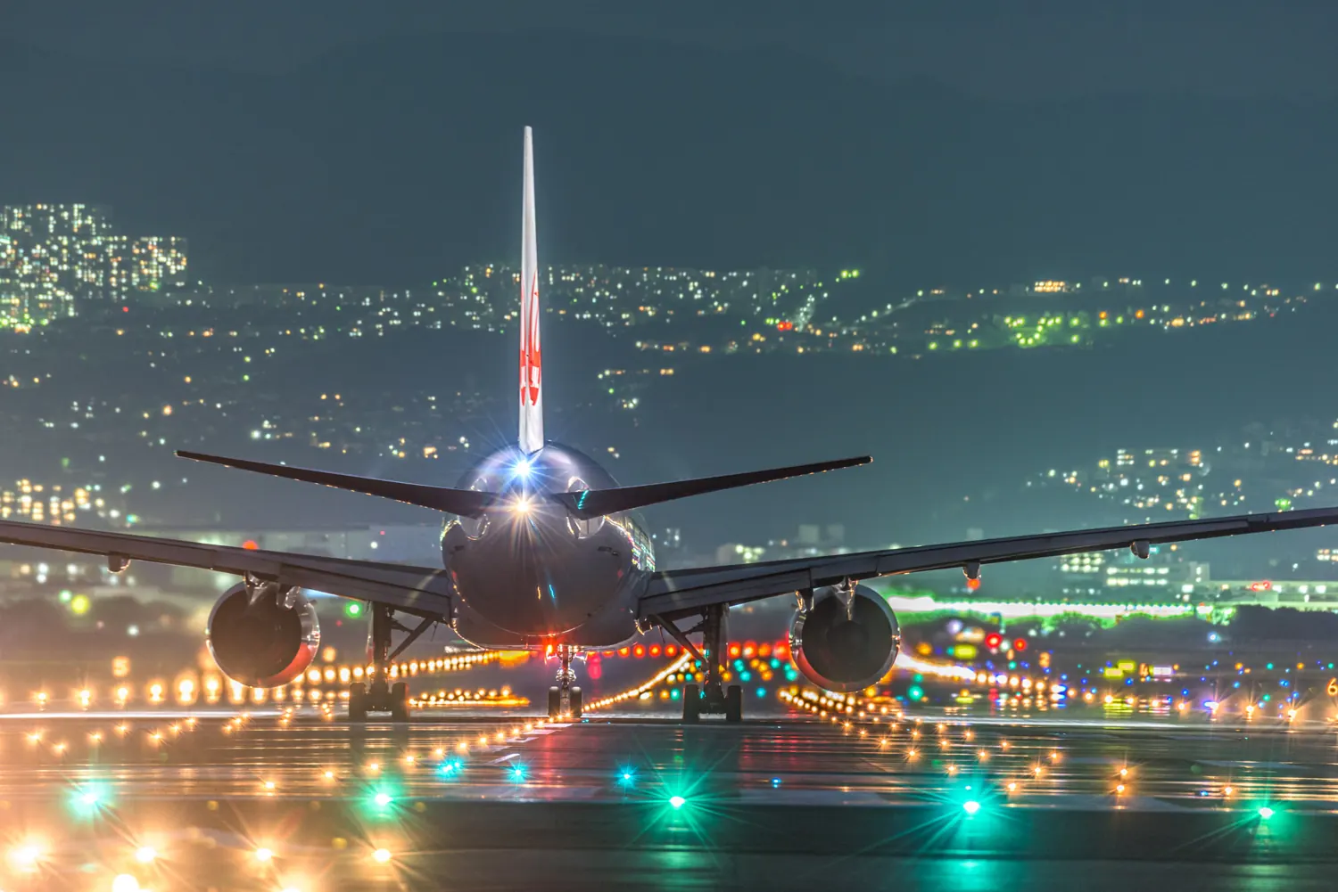 Airplane on the runway at night